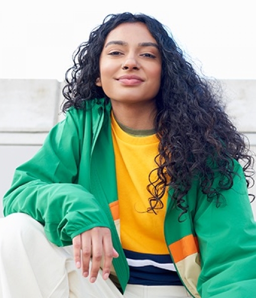 Woman in brightly-colored outfit